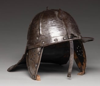 NORTHERN EUROPEAN 1650 LOBSTER TAIL HELMET.
