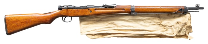 WW2 TYPE 99 ARISAKA RIFLE WITH BRINGBACK PAPER.