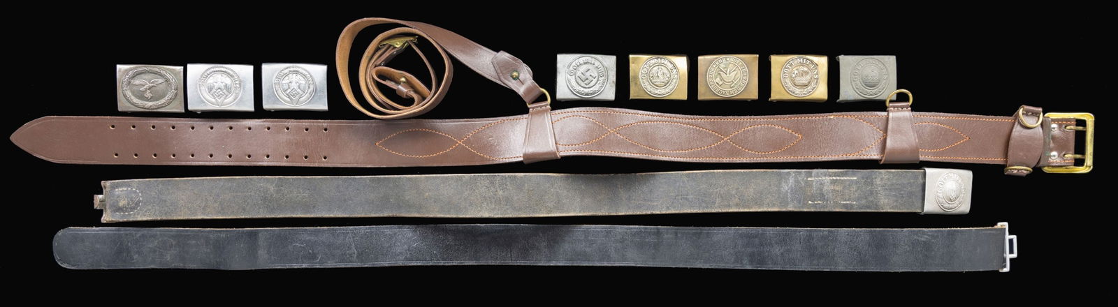 GERMAN BELTS & BUCKLES, BUCKLES, & A RUSSIAN BELT.: This group includes 2 Aluminum HJ buckles. / 1 Aluminum alloy Police buckle. / 1 Steel Luftwaffe buckle. / 1 Steel WWI army buckle. / 1 WWI Fire Service buckle. 2 WWI brass Army buckles with nickel ce
