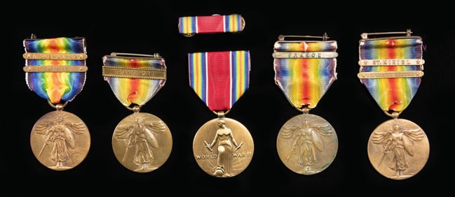 4 WWI US VICTORY MEDALS AND 1 WWII EXAMPLE.