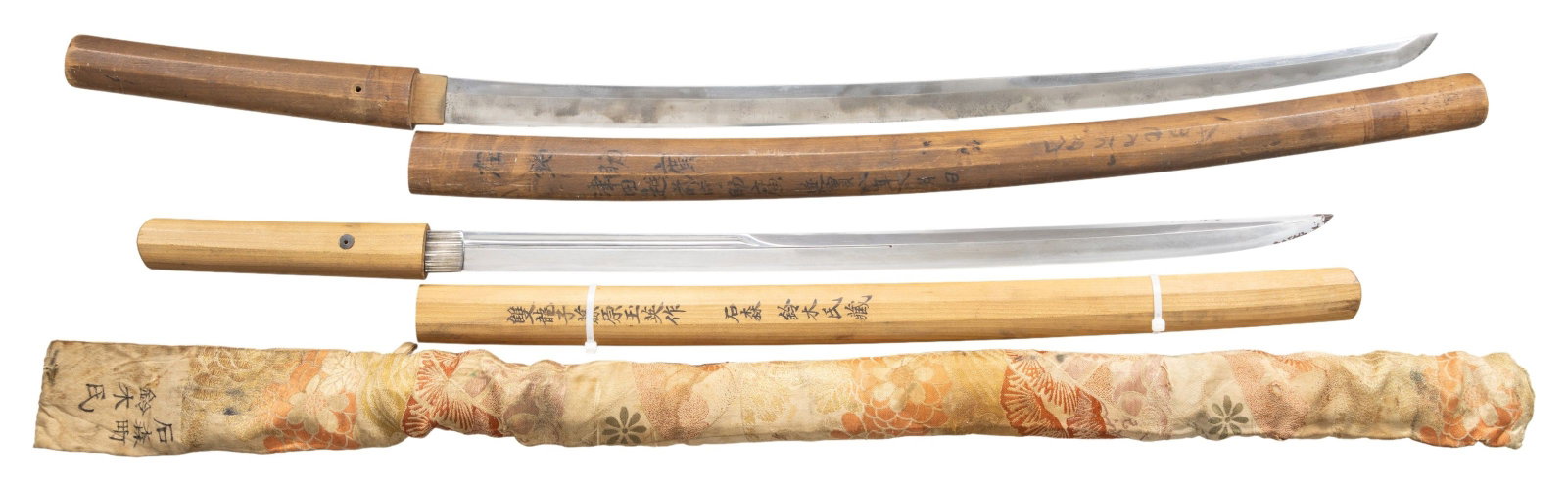 2 KATANA BLADES IN SHIRASAYA.: KATANA. A scarce and fine katana with a shobu-zukuri blade in a shirasaya measuring 32 1/2" overall with a 24 1/2" blade. Blade has a straight hamon with a 12 1/2" narrow hi and a wider, shorter hi ex