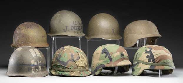 LOT OF 8 USGI HELMETS.
