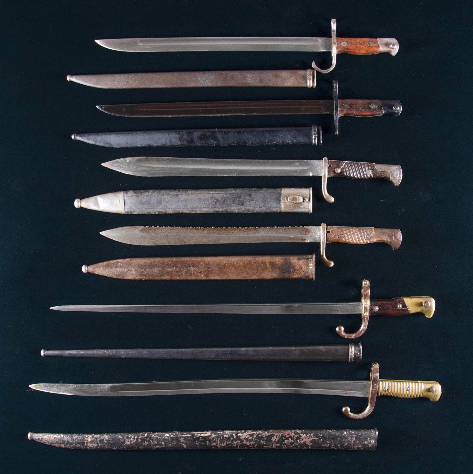 LOT OF 6 FOREIGN MILITARY BAYONETS.: Lot consists of 6 foreign military bayonets, including: 1) 1 Imperial German M1898/05 bayonet. Blade measures 14 1/2", with an overall length of 19 11/16". Left side of ricasso is marked "CARL EICKHOR