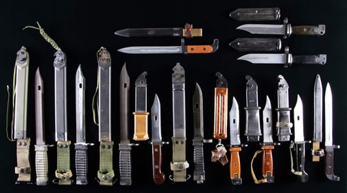 GROUPING OF 12 COLD WAR ERA BAYONETS.