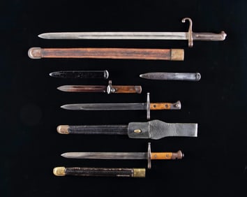 DESIRABLE GROUP OF FOUR ITALIAN BAYONETS.