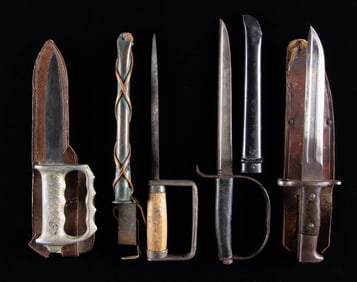INTERESTING GROUPING OF FOUR FIGHTING KNIVES.