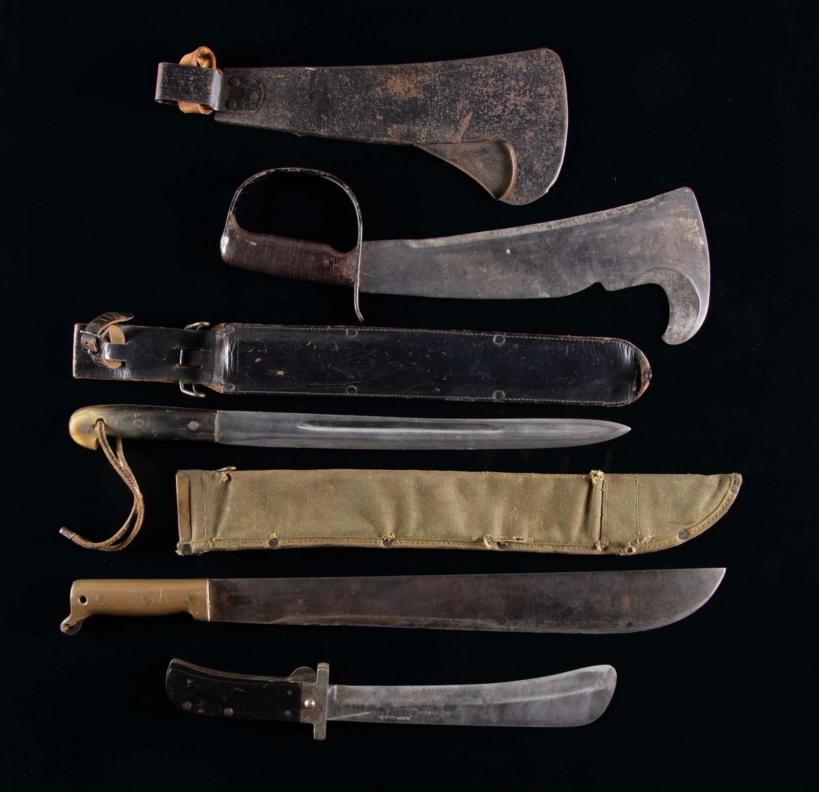 FOUR MILITARY MACHETES.: 1) Army Air Force Folding Machete Survival Knife. Included in the B-4 emergency bail-out kit. 10" blade. 15 1/2" overall. Metal including blade is bright. Black plastic handle is secured w/ five steel