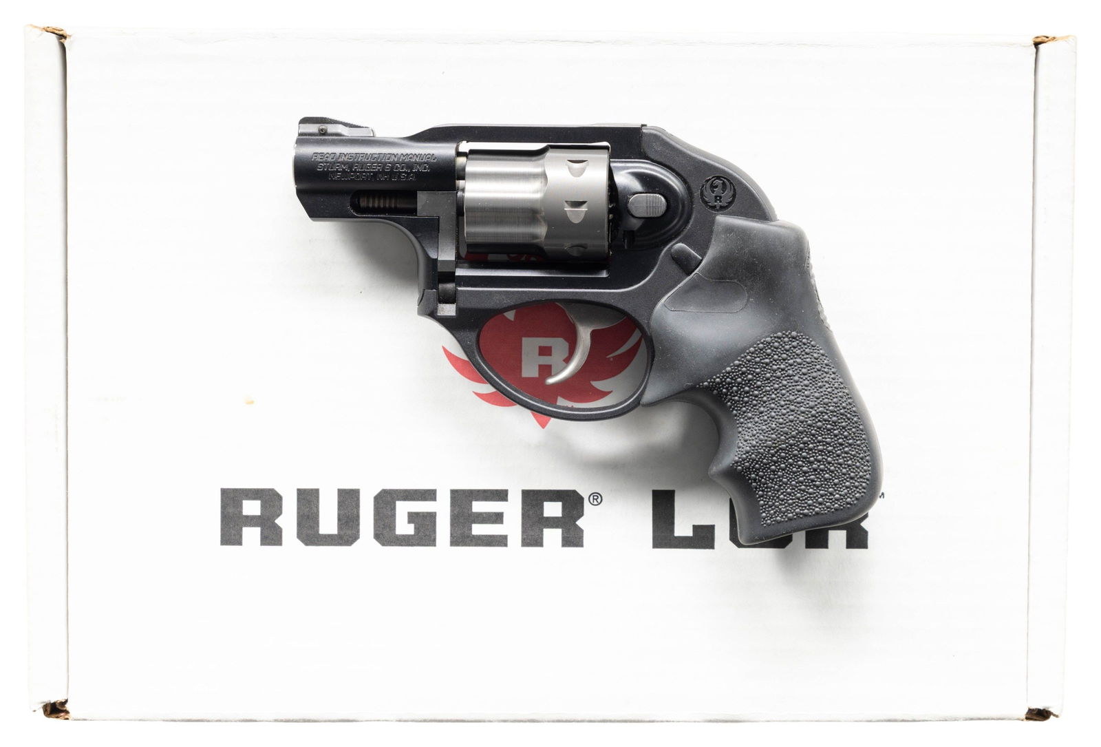 BOXED RUGER MODEL LCR 22 LR DAO REVOLVER.: Cal. 22 LR. S# 548-06754. Bbl. 1.87" with replaceable pinned serrated blade front sight; frame notched rear. Mfg. 2012 as Model 05410 having PVD finish on its 8 rd. fluted cylinder. Hogue Tamer Monogr