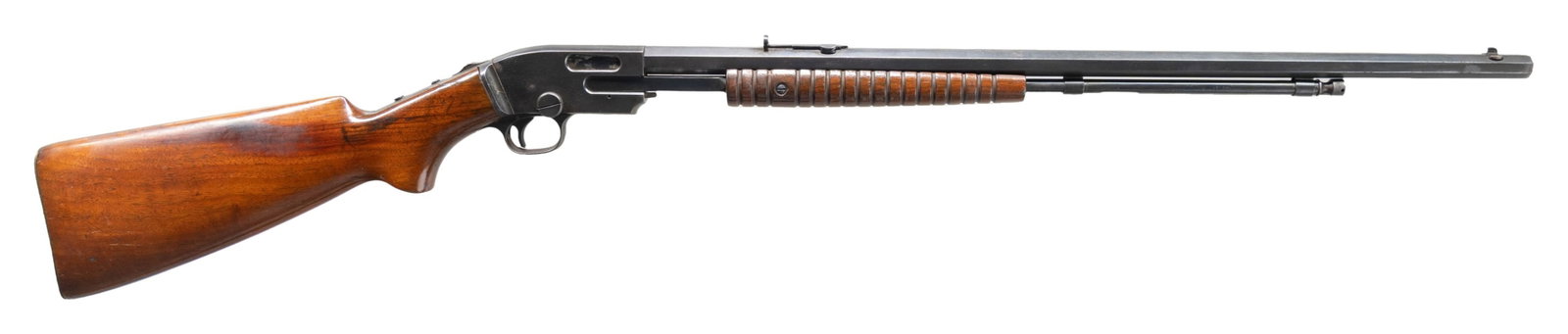 SAVAGE 1914 PUMP ACTIION RIFLE.: Cal. 22 S, L & LR. S# 25948. Bbl. 23 1/2" oct. Bead front sight. Redfield sporting style rear sight. Upper tang has two screws present for further sight mounting. Reblued finish. Walnut stock set with