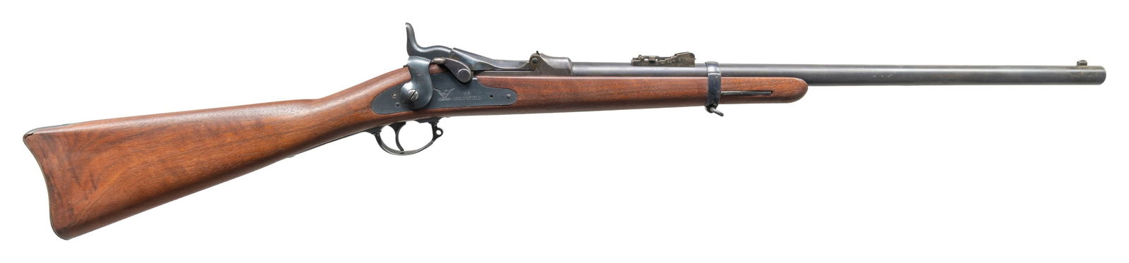 SPRINGFIELD U.S. MODEL 1879 TRAPDOOR CARBINE.: Cal. 45-70. S# 108844. Originally mfg. 1879. Bbl. 22" w/ barleycorn front sight & 1879 carbine rear sight. 1873 dated, low arch breechblock. Replacement low comb walnut stock w/ poor fitting saddle ri