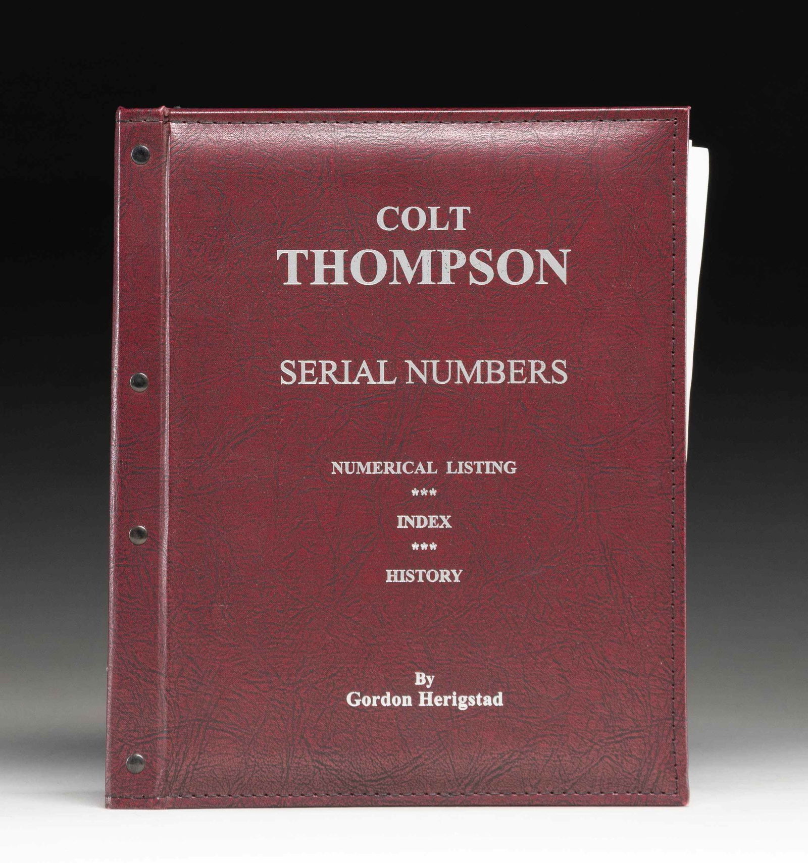"NO. 155" COLT THOMPSON SERIAL NUMBERS BOOK BY: GORDON HERIGSTAD. No. 155 copy of "Colt Thompson Serial Numbers" by Gordon Herigstad. Book features serial number and shipping information of individual Thompson submachine guns, with the table of
