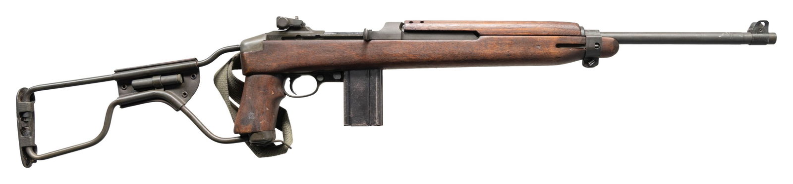 U.S. WWII INLAND M1A1 SEMI-AUTO PARATROOP CARBINE.: Cal. 30 Carbine. S# 5335924. Bbl. 18". Barrel marked "INLAND MFG. DIV. / GENERAL MOTORS / 7-44". Stamped adjustable aperture rear sight marked "I.R. CO.". Blade front sight w/ protective ears. Wide ba