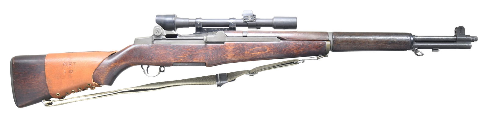 SPRINGFIELD MODEL M1C GARAND SEMI-AUTO SNIPER: RIFLE. Cal. 30-06. S# 3860212. Bbl. 24". Marked on the right side "S-A-2-49". Throat & muzzle gauge: 1.0. Rifle receiver was produced in the spring of 1945. The blued steel scope base on the left side