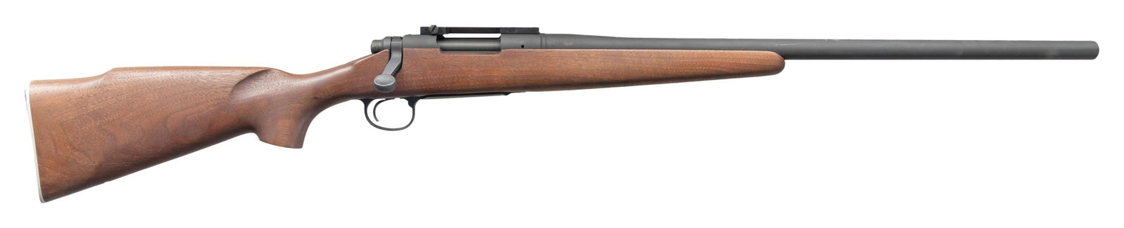 REMINGTON M40 COMMEMORATIVE BOLT ACTION SNIPER: RIFLE. Cal. 308 Win. S# SSA0010. Bbl. 24" heavy profile. Unmarked Redfield style scope base. Left rear of receiver has two vacant sight holes. Underside of bolt has matching electro pencil number. Rem