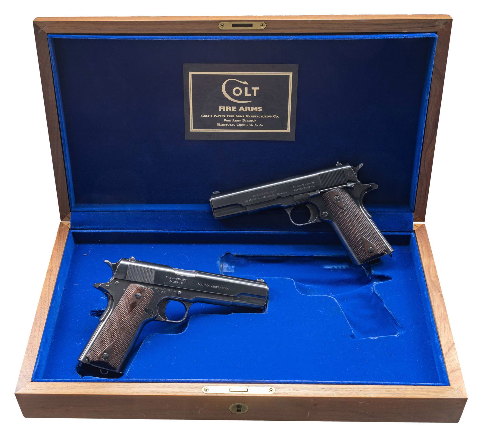 CONSECUTIVE PAIR OF ARGENTINE NAVY CONTRACT COLT: COMMERCIAL GOVERNMENT MODEL 1911 SEMI AUTO PISTOLS WITH LINEAGE TO 2 ARGENTINE BATTLESHIPS. ALL: Cal. 45 ACP. Per "Colt .45 Government Models (COMMERCIAL SERIES) 1912 through 1970" by Charles W. Claws