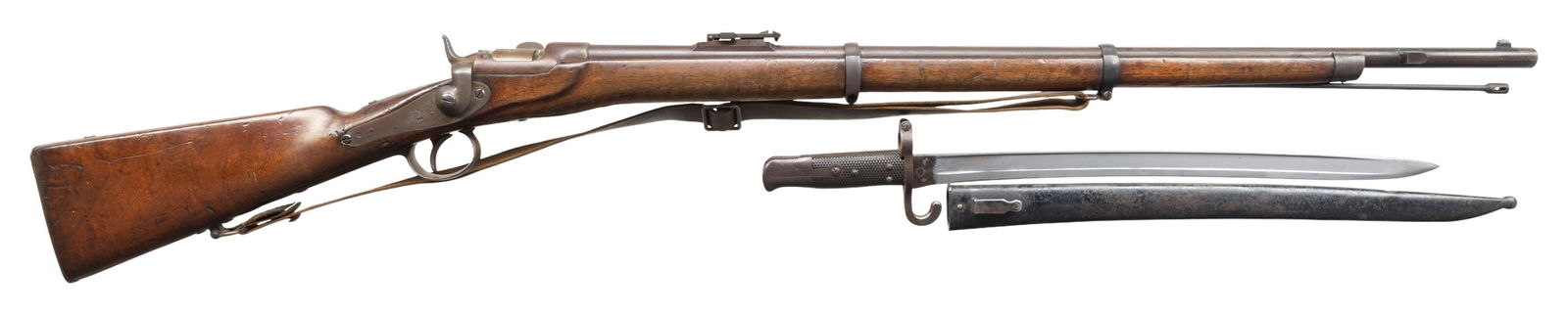 AUSTRIAN 1866/77 WERNDL SINGLE SHOT RIFLE.: Cal. 11mm Werndl. S# 868. Bbl. 33". Ladder rear sight graduated to 1400 Schritt. Lock appears to have 1868 date. Rear of bbl. has "ST 70" marking. Buttplate has unit marking that reads "65LST/21 35".