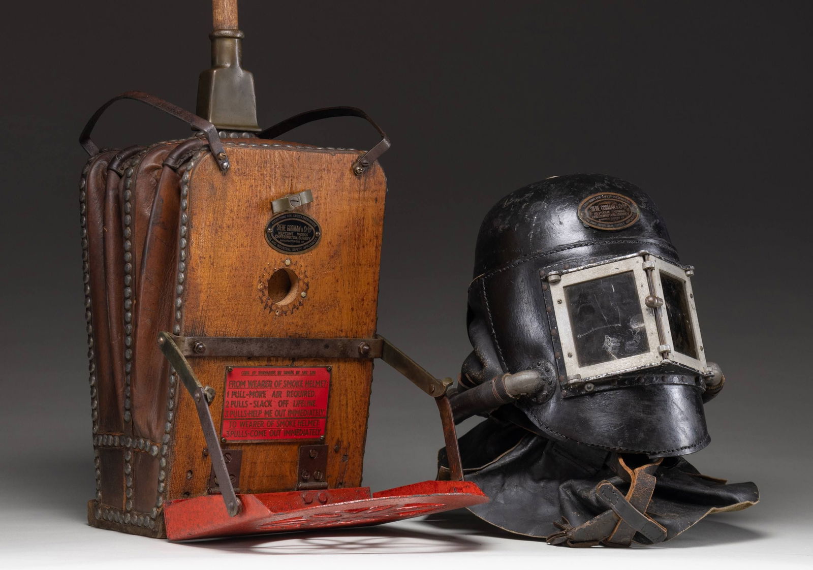 RARE SIEBE GORMAN & CO. LTD. 1878 "SMOKE HELMET": WITH BELLOWS. Fireman's "Smoke Helmet" mfg. by Siebe Gorman & Co. LTD. circa. 1878. Siebe Gorman was prominent name for diving gear in the 1830s, and was the first company to register the "Smoke Helme