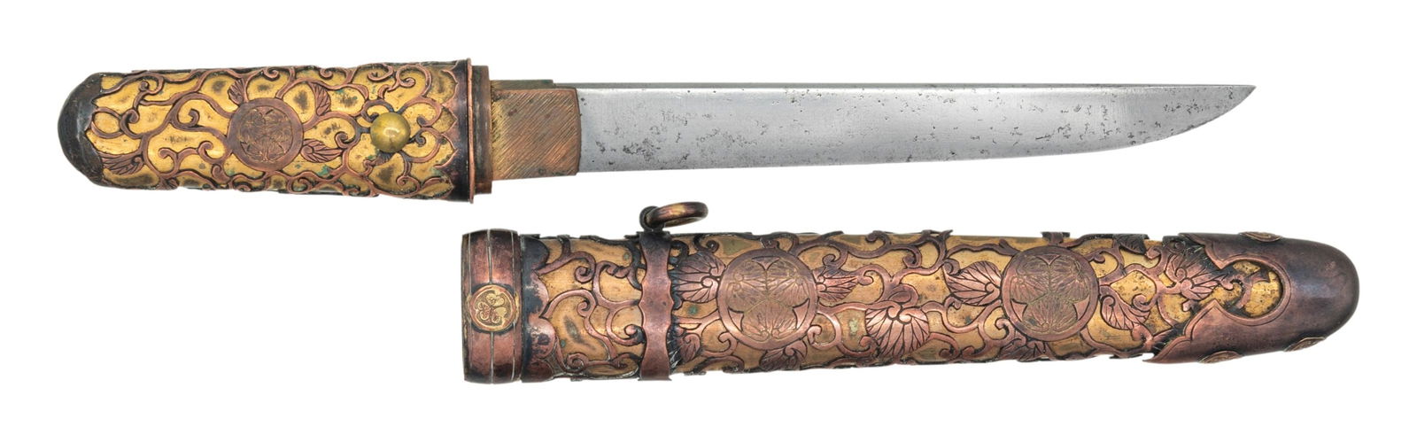 EARLY JAPANESE KWAIKEN.: This elaborate kwaiken measures 10" overall with a 5 7/8" blade and a textured gilded copper habaki. The tsuka has a gilded brass interior with an overlaid one piece copper vine, fuchi and kashira.