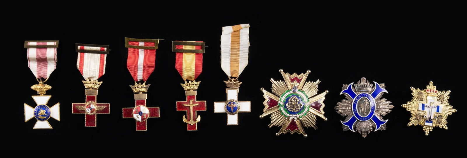 8 SPANISH ORDERS AND AWARDS.: 1) The Spanish Order of Isabella the Catholic was established in 1815 by Royal decree of King Ferdinand VII and is Spain's highest civil honor. This example includes the Breast Star likely of the latt