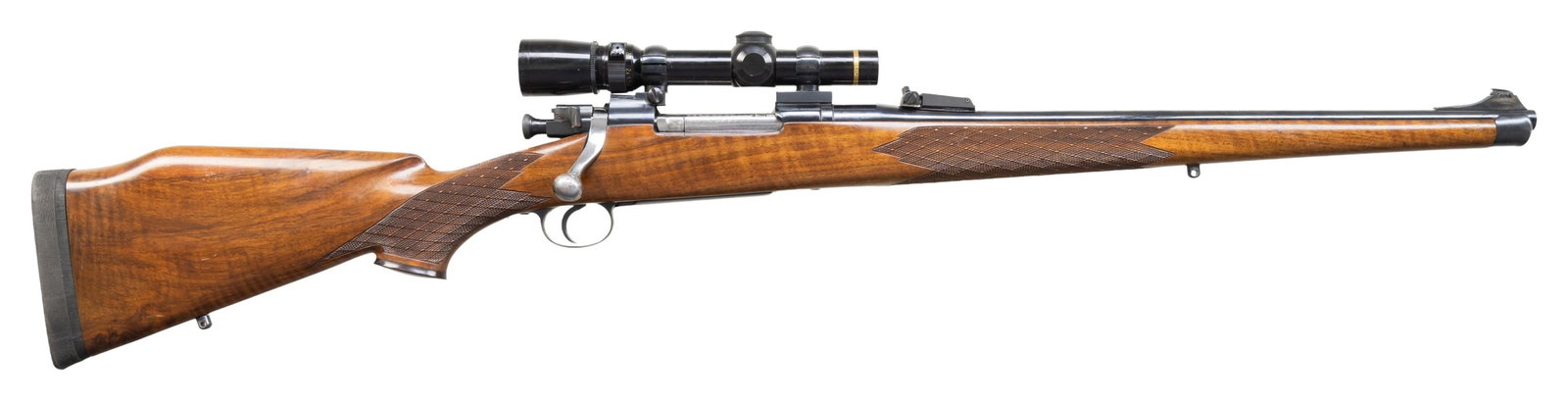 LEONARD MEWS FULL STOCK '03 SPRINGFIELD CARBINE: WITH SCOPE. Cal. 350 Rem. Mag. S# 4015294 (found under front scope base). The 20" lightweight sporter barrel is fitted with Thompson center adjustable rear sight and silver bead front in short ramp.