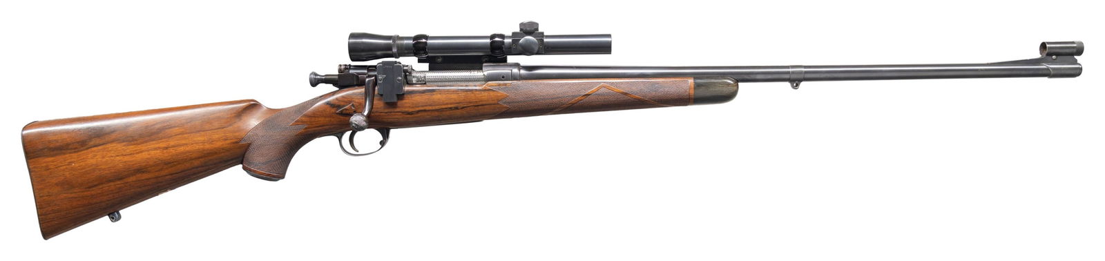 INVESTMENT GRADE R.G. OWEN 'O3 SPRINGFIELD SPORTER: WITH SCOPE. Cal. 30-06. S# 703. The 24" reshaped military barrel is engraved "CAL. 30/06 R.G. OWEN-SAUQUOIT, N.Y. no 703" on top rear. Barrel is fitted with sleeved on front ramp with dovetailed hood