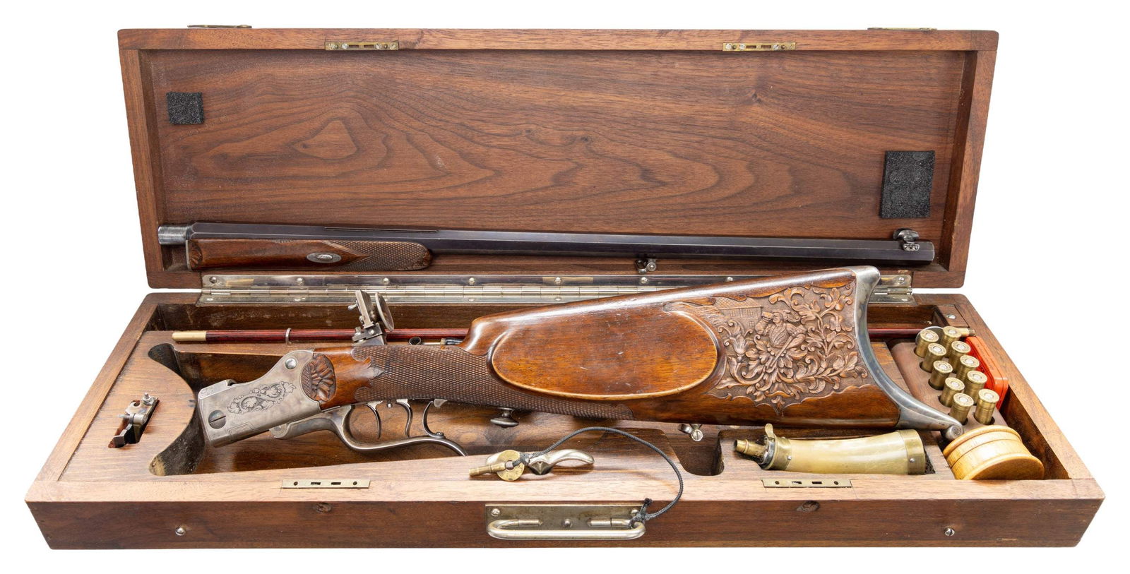 SUPERB QUALITY TAKEDOWN MARTINI ACTION OFFHAND: TARGET/HUNTING RIFLE BY SCHMIDT & HABERMANN WITH CASE AND ACCESSORIES. Cal. 8x32R Tesching (consignor states). S# NSN. The 25-5/8" octagon barrel is silver inlaid with maker's name and address on top