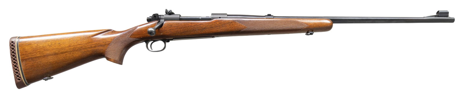 HIGH CONDITION PRE-64 WINCHESTER MODEL 70 BOLT: ACTION RIFLE. Cal. 30-06. S# 125487. Bbl. 24". Model 70 bolt action rifle mfg. by Winchester in 1949. Left side of the bbl. is marked with Winchester's mfg. information, as well as the model and cal.