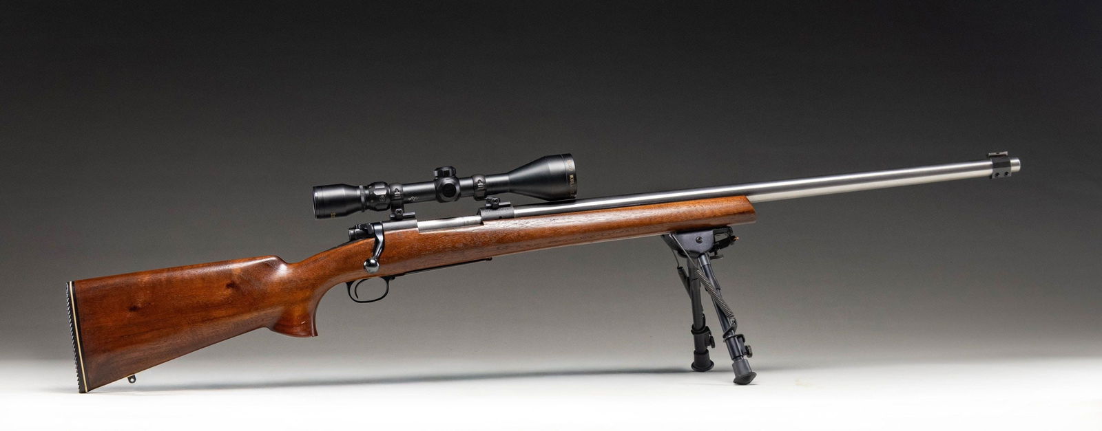 CUSTOM WINCHESTER MODEL 70 .308 WINCHESTER BOLT: ACTION TARGET RIFLE. Cal. 308 Win. S# G1313061. Bbl. 26 7/8". Model 70 bolt action rifle mfg. by Winchester in 1977 and subsequently customized into a target/competition configuration. The underside o