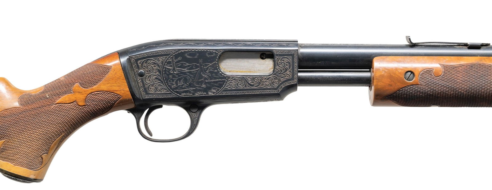 NICK KUSMIT ENGRAVED WINCHESTER MODEL 61 MAGNUM: PUMP RIFLE. Cal. 22 Mag. S# 343694. Bbl. 24" rnd. with replacement bead front sight and original sporting rear sight missing elevator. Receiver is grooved for scope attachment. Tubular mag. Action has