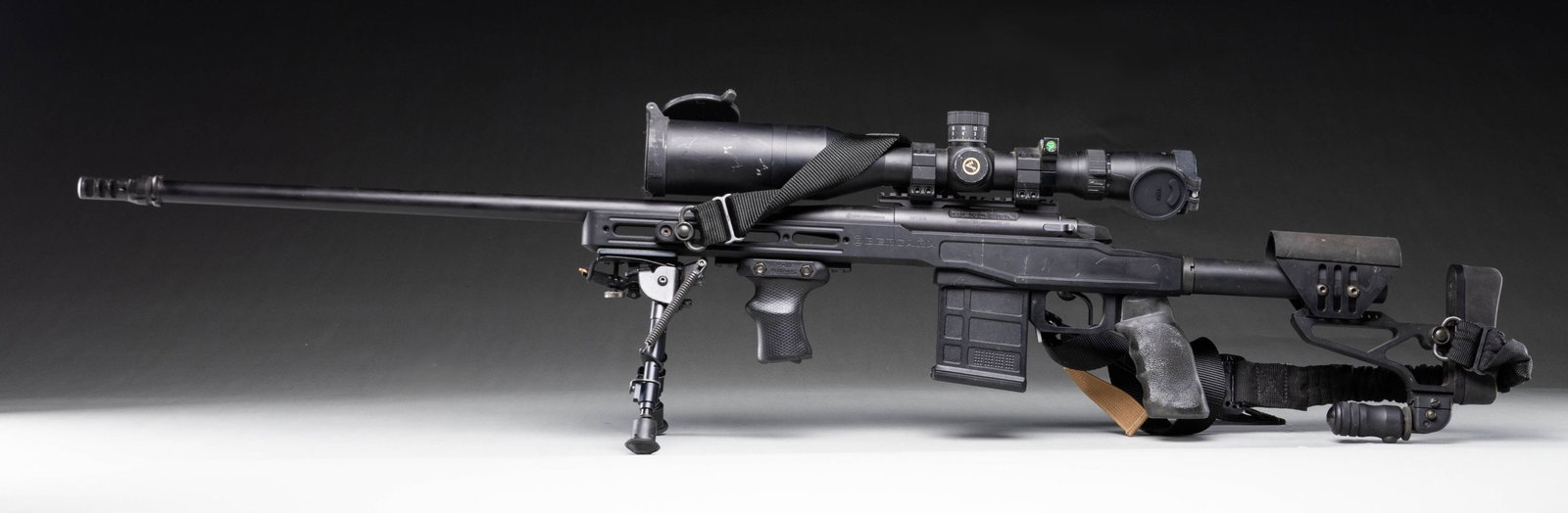 BERGARA B14 PREMIER MGLITE BOLT ACTION RIFLE.: Cal. 6.5mm Creedmoor. S# D01308. Bbl. 28" with muzzle brake. Rifle is sighted with an Athlon 4.5-29x56 scope. Scope has mil-dot crosshair reticle, very good optics & folding scope caps. Matte black fi