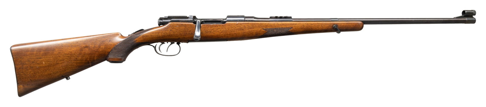 MANNLICHER SCHOENAUER MODEL 1924 BOLT ACTION: SPORTING RIFLE. Cal. 8x60 mm. S#. 1101. Bbl. 24" tapered round. Ramp mounted bead front sight is equipped with an over size modern hood. The original rear sights consist of a 3 folding leaf express si