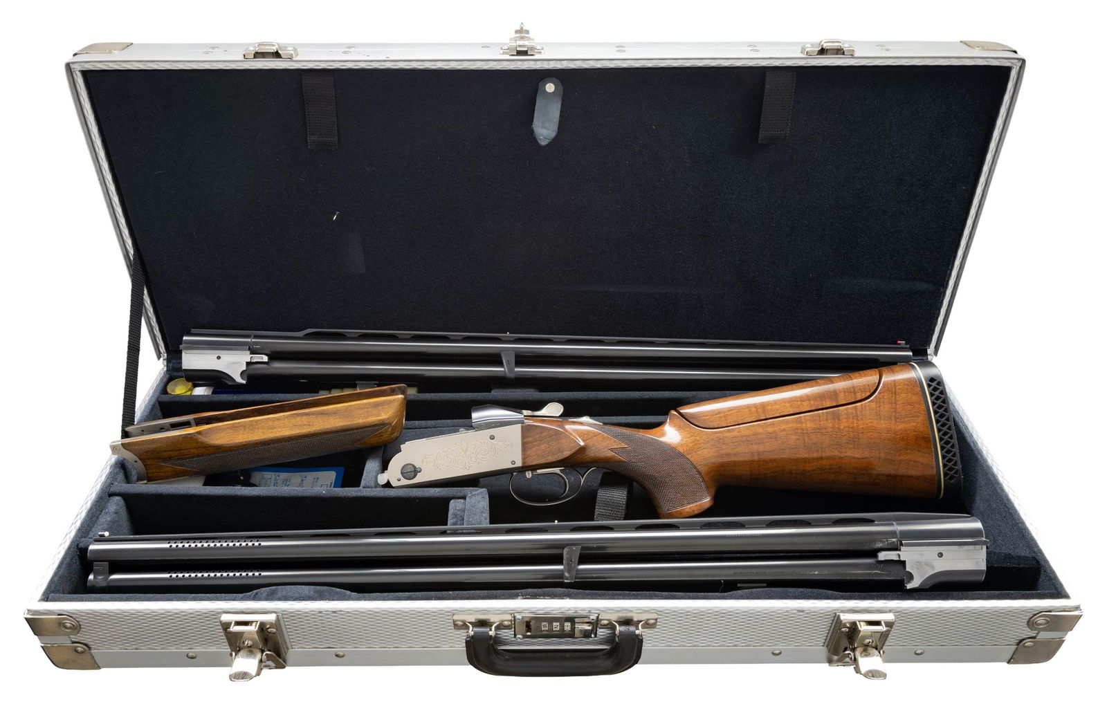 KREIGHOFF K80 LIGHTWEIGHT TWO BARREL AND TUBE: SET O/U SHOTGUN. Cal. 12 ga. S# 13388. Bbl. Set 1: 28" is serial numbered to the gun with 3" chambers and 5/16" vent rib. White target front sight with steel mid bead. Both barrels have fixed Tula ske