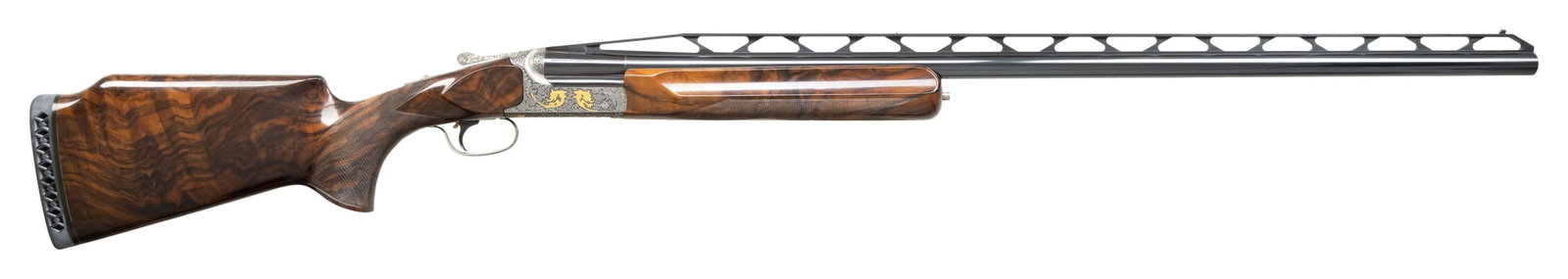 BADILLINI ENGRAVED & GOLD INLAYED PERAZZI SINGLE: BARREL TRAP GUN. Cal. 12 Ga. 2-3/4". S# 112120. Made as a single shot only this fine gun with removable trigger group has 34" fixed full choke barrel with high raised skeletonized matted rib. Bottom o