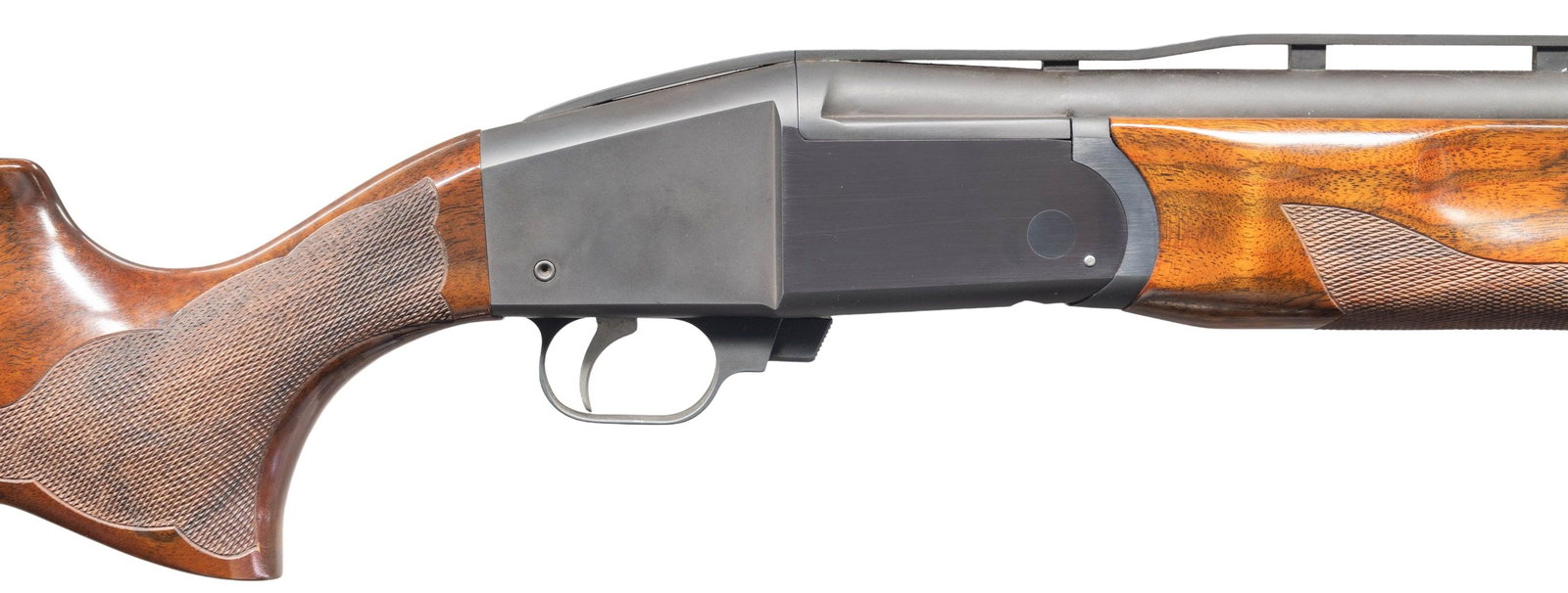 RARE LJUTIC O/U (BI GUN) WITH CASE.: Cal. 12 Ga. 2-3/4". S# 50. The 34" monobloc barrels choked mod and full are fitted with raised matted ventilated rib holding two white beads. Assembly #13 is stamped on barrels and action and scratche