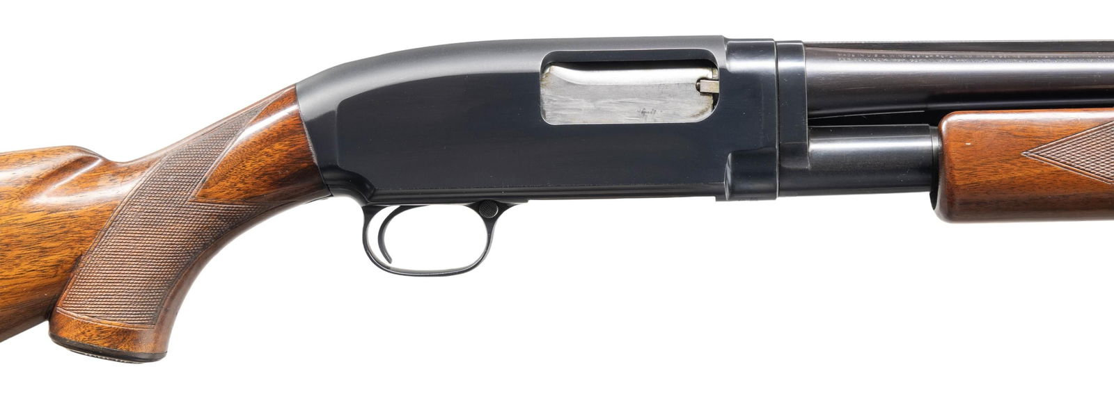 WINCHESTER MODEL 12 SKEET GRADE PUMP SHOTGUN.: Cal. 20 ga. 2 3/4". S# 819485. Bbl. 26" with solid rib. Red target front sight with steel mid bead. Barrel is choke marked "WS-1". Patent marking below the choke marking shows an unusual double stamp.