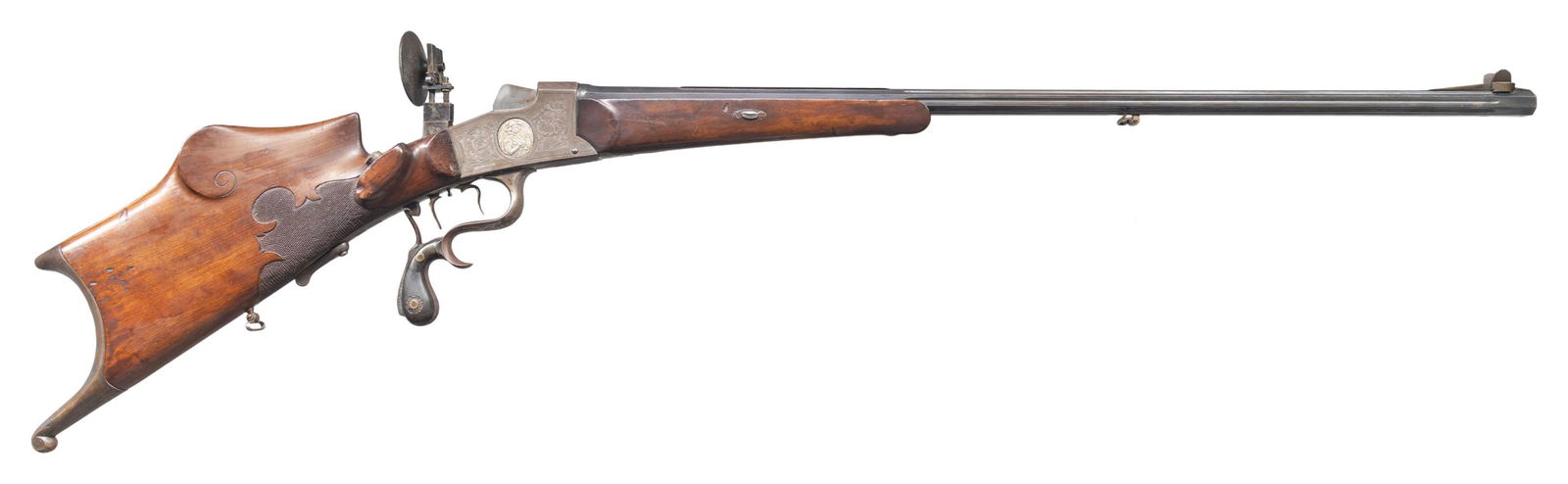 BUCHEL MEISTER SINGLE SHOT SCHUETZEN RIFLE.: Cal. 8.15x46R. S# 923 (Found on inside of action tang with trigger group removed and on front of action forend removed. Also on forend bolt). The 31-3/4" fluted octagon barrel has milled in broad base