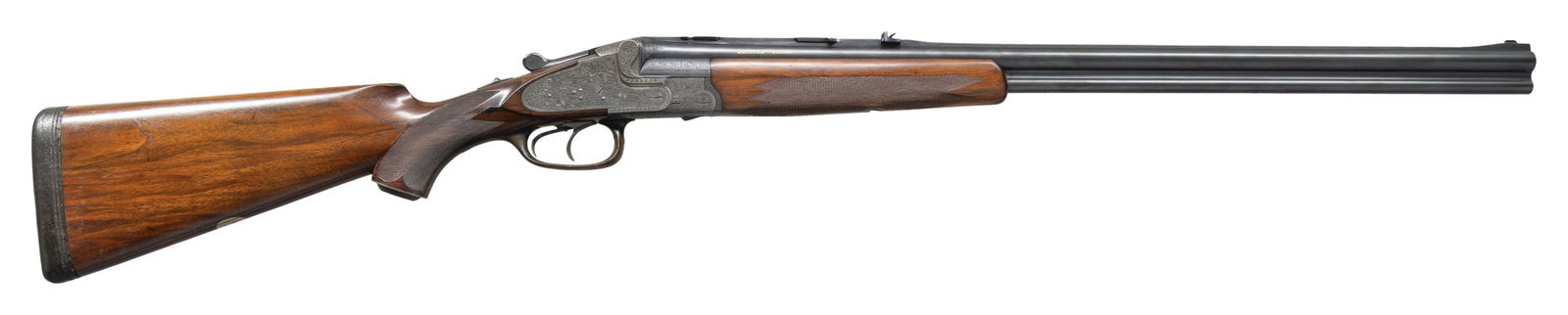 BEAUTIFULLY ENGRAVED SIDELOCK O/U COMBINATON GUN: BY FRANZ KETTNER. Cal. 16 Ga. 2-5/8"/9x57R. S# 2120. The 26-3/8" demi-block barrels are fitted with full length matted rib; central portion cut away forming quarter rib and front sight ramp. Quarter r