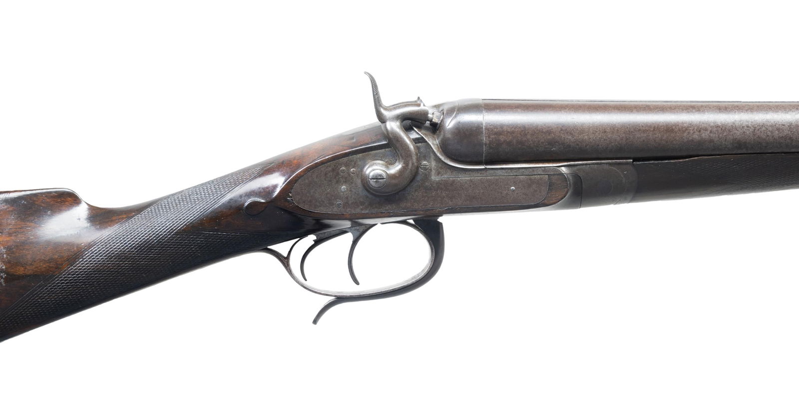 BEST QUALITY PLAIN FINISH JAMES PURDEY BAR-IN-WOOD: HAMMER GUN WITH SCARCE DAW LEVER ACTION. Cal. 12 Ga. 2-3/4". S# 10321. Many feel that the bar-in-wood hammer gun is the most elegant breechloading shotgun ever produced. Other people believe that the