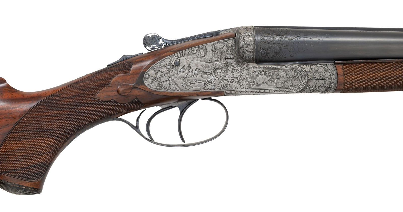 SUPERB RELIEF ENGRAVED F.W. HEYM SLE 16 GA. GAME: GUN . Cal. 16 Ga. 2-3/4". S# 32604. The 27-1/2" dovetailed barrels with narrow matted rib are engraved "FR. Wilm. Heym." "MUNNERSTADT/BAY." on tops. Breech ends are deep relief engraved with 1-1/2"