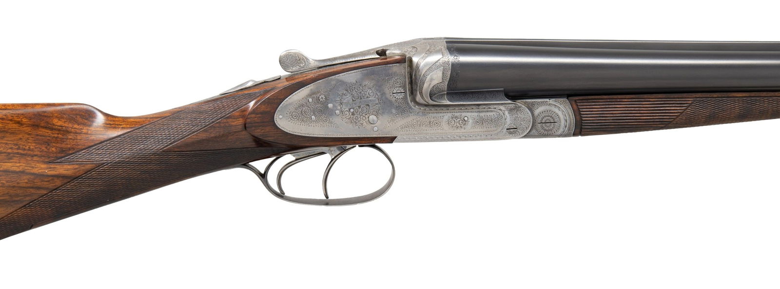 FINE SLE PIGEON GUN BY NOWOTNY OF PRAGUE.: Cal. 12 Ga. 3". S# 15496 (1915). This beautifully made gun has 28-3/8" dovetailed steel barrels with narrow raised matted rib holding two white beads. Tops of barrels are engraved "NOWOTNY J." on