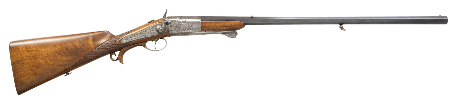 INTERESTING BREECH LOADING PERCUSSION RIFLE BY: J. SPRINGER. Cal. 36. S# 2768. The 24" swamped octagon barrel is fitted with single standing leaf "U" notch rear and silver bead front sights. Top flat is engraved "J. Springer in Wien" "Stock in Eise