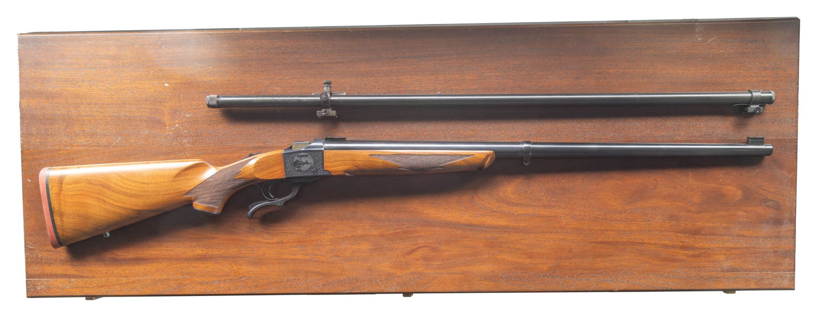 CASED RUGER No. 1 LYMAN 1 of 1000 COMMEMORATIVE: FALLING BLOCK RIFLE SET. Cal. 45-70 GOVT. S# 131-50697. Bbl. 28" "D" contour heavy target weight with banded swivel base plus target scope blocks at each end. Mfg. 1979 having Lyman 1878-1978 Centenni