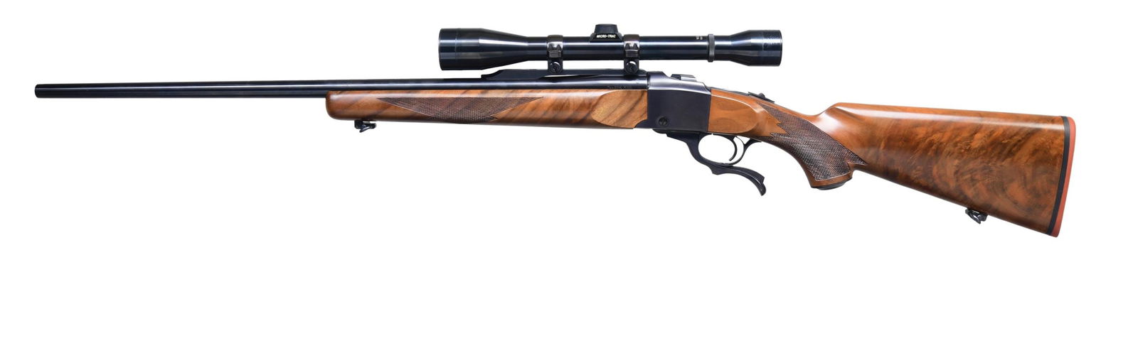 7MM REM MAG. RUGER NO. 1-B SINGLE SHOT RIFLE.: Cal. 7mm Rem. Mag. S# 131-38378. Mfg. 1978 as Model 01315. This example features a blued finish on the 26-inch round barrel and receiver; barrel has warning markings & quarter rib. The rifle boasts a
