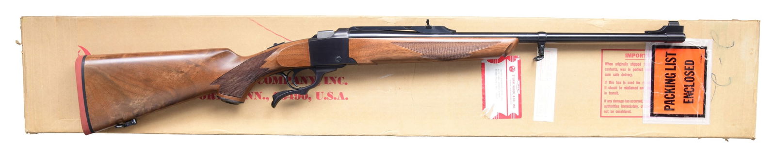 223 REM RUGER NO. 1-A SINGLE-SHOT RIFLE WITH: MATCHING FACTORY BOX. Cal. .223 Rem. S# 132-41991. Shipped 1983 as Model 01342. The rifle features a 22-inch blued barrel, equipped with a bead front sight and an flip up rear sight on quarter rib.