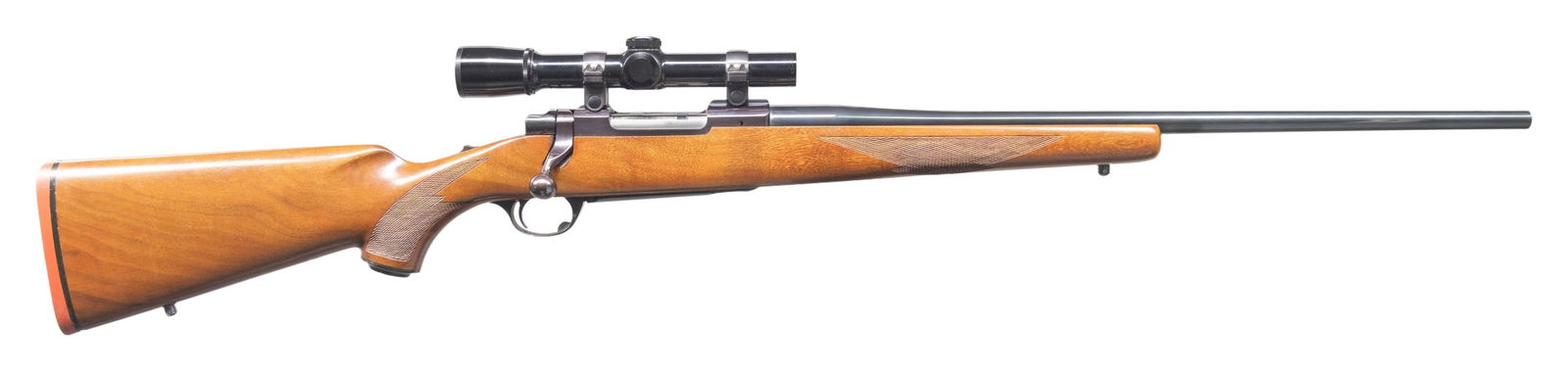 VERY NICE RUGER M77 .358 WINCHESTER BOLT ACTION: RIFLE. Cal. 358 Win. S# 71-37872. Bbl. 21 7/8". M77 bolt action rifle mfg. by Ruger in 1975. Top of the rnd. tapered bbl. is marked with Ruger's single line address, with the cal. designation marked