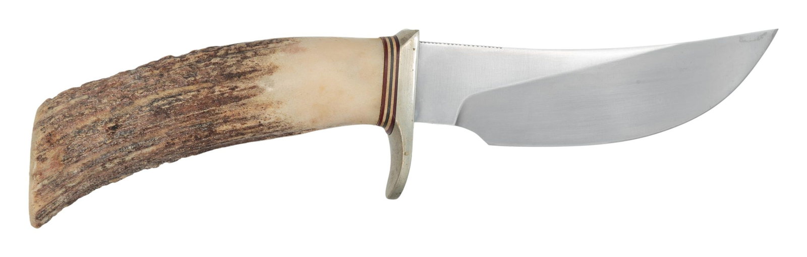 RANDALL MODEL 20 YUKON SKINNER KNIFE.: 9" overall length with 4 1/2" blade marked "RANDALL MADE/ORLANDO, FL S". 1" serrated section on top of blade. Silver plated hilt. Stag handles. No scabbard or stone present. CONDITION: handles show