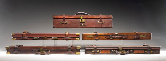 5 HARD TRUNK TYPE GUN CASES.