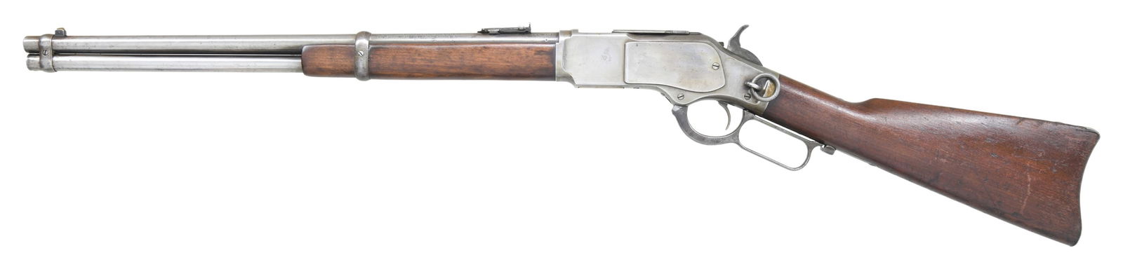 WINCHESTER 1873 THIRD MODEL LEVER ACTION SADDLE: RING CARBINE. Cal. 44 WCF (44-40). S# 681077B. Bbl. 20" rnd., with pinned blade front sight and carbine leaf rear sight. Full length mag. Left side of action has staple attached saddle ring. Original
