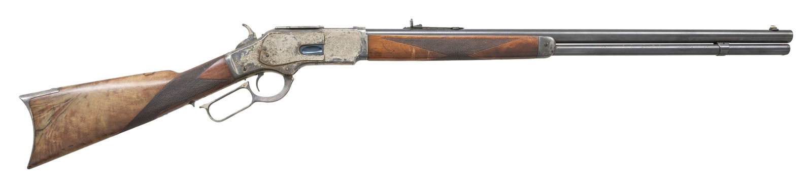 WINCHESTER THIRD MODEL 1873 CUSTOM ENGRAVED LEVER: ACTION RIFLE. Cal. 38 WCF (38-40). S# 194258P. Bbl. 24" rnd. Sporting sights. Full length mag. Action has generous coverage of aftermarket vine type foliate scroll hand engraving with vignettes featur