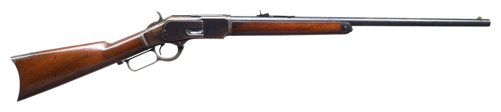 WINCHESTER 1873 THIRD MODEL LEVER ACTION RIFLE.: Cal. 32 WCF (32-20). S# 243477B. Bbl. 24" rnd., with original sporting sights. Button mag. Blue finish, with case colored hammer and lever. Walnut forearm and stock, with crescent steel buttplate.